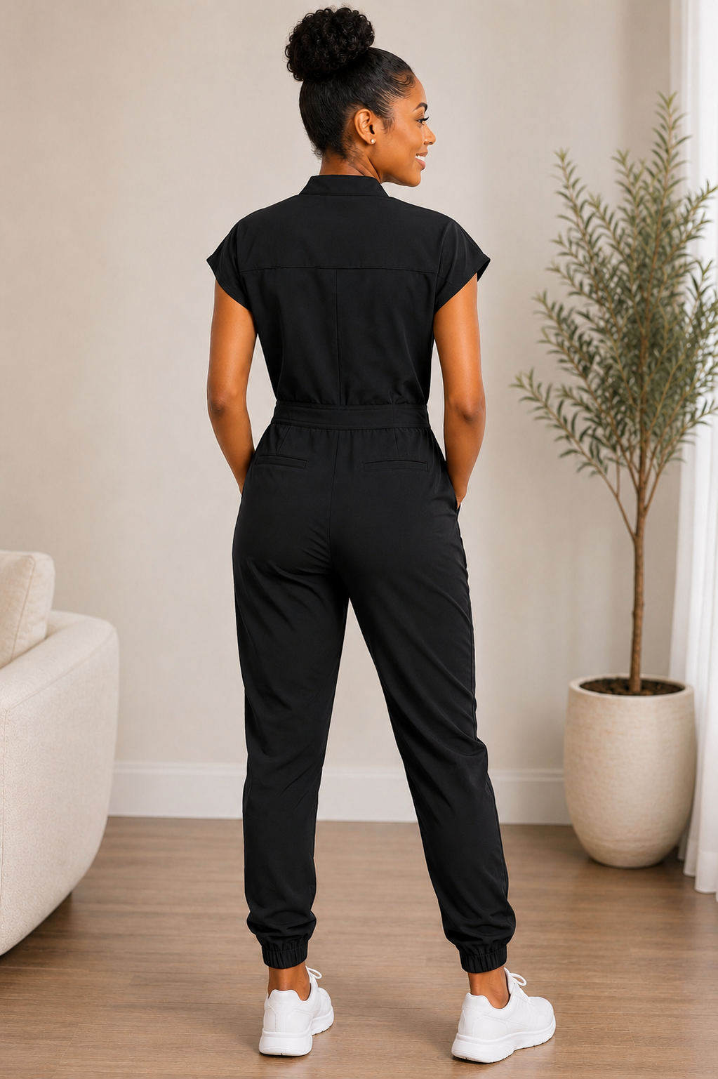 Women's Scrub Jumpsuit in Navy - front view on model